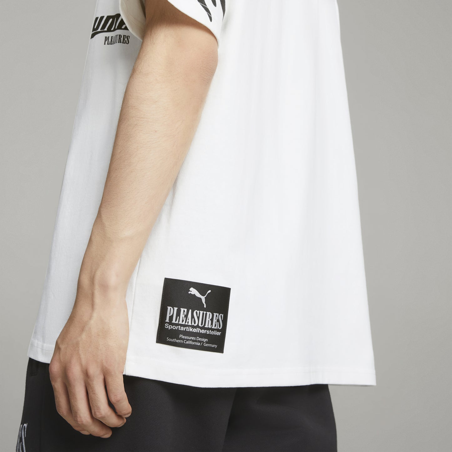PUMA X PLEASURES SUN GRAPHIC TEE