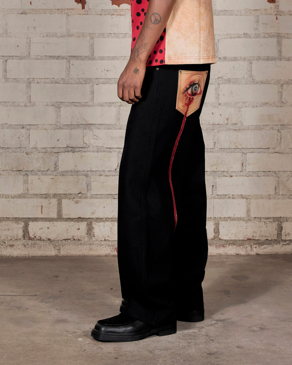 TEAR FORMULA BAGGY JEANS