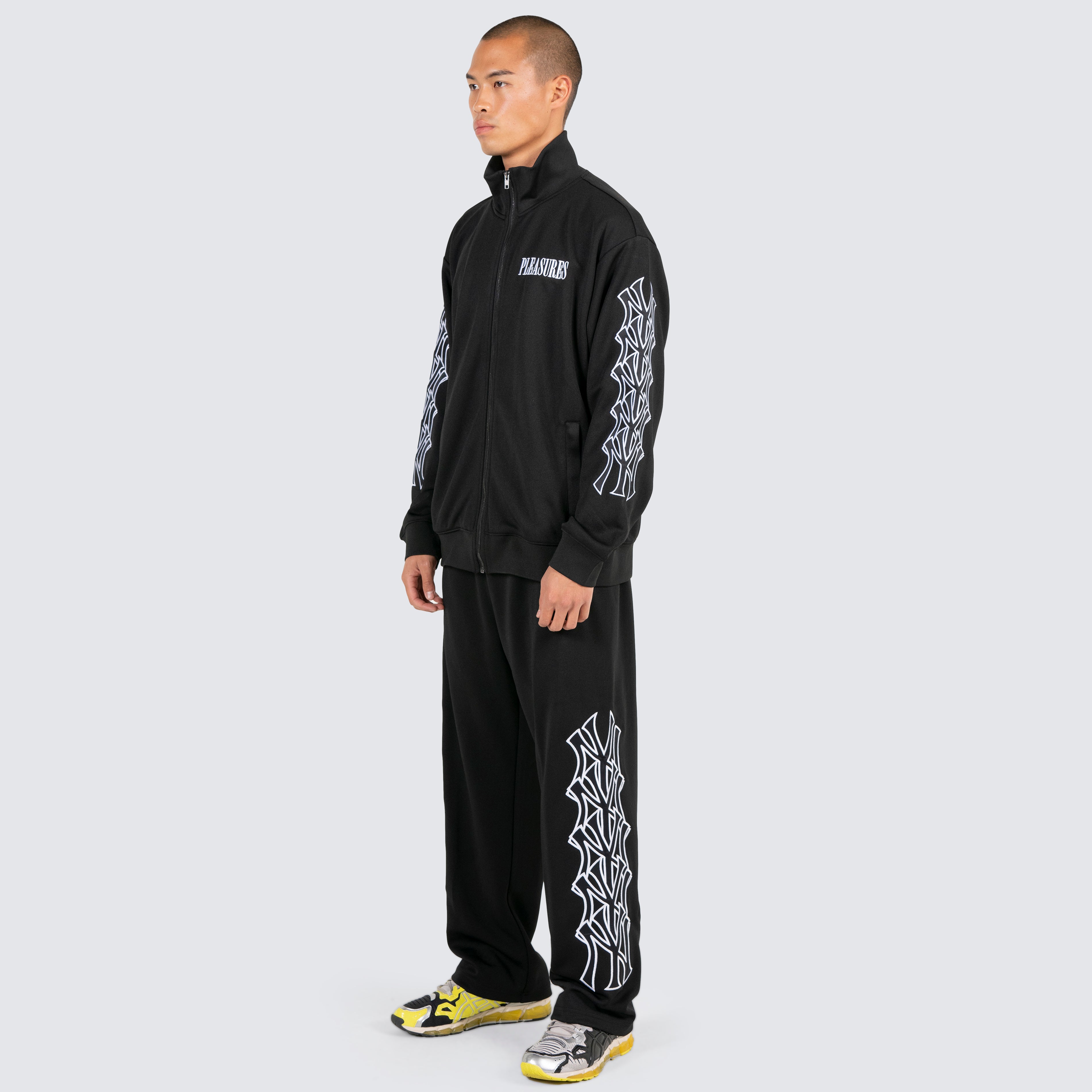 Pleasures tracksuit deals