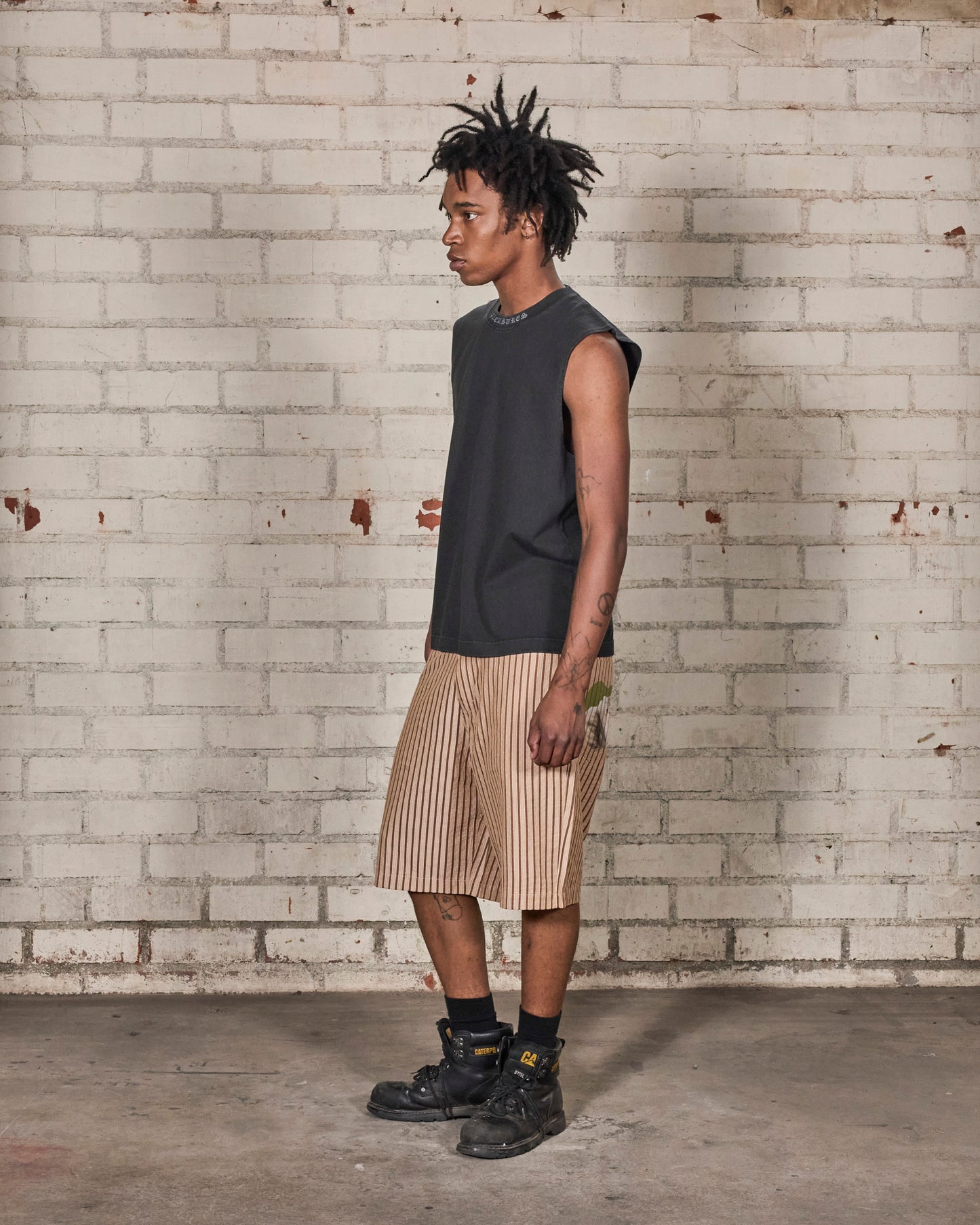 SORROW SLEEVELESS SHIRT