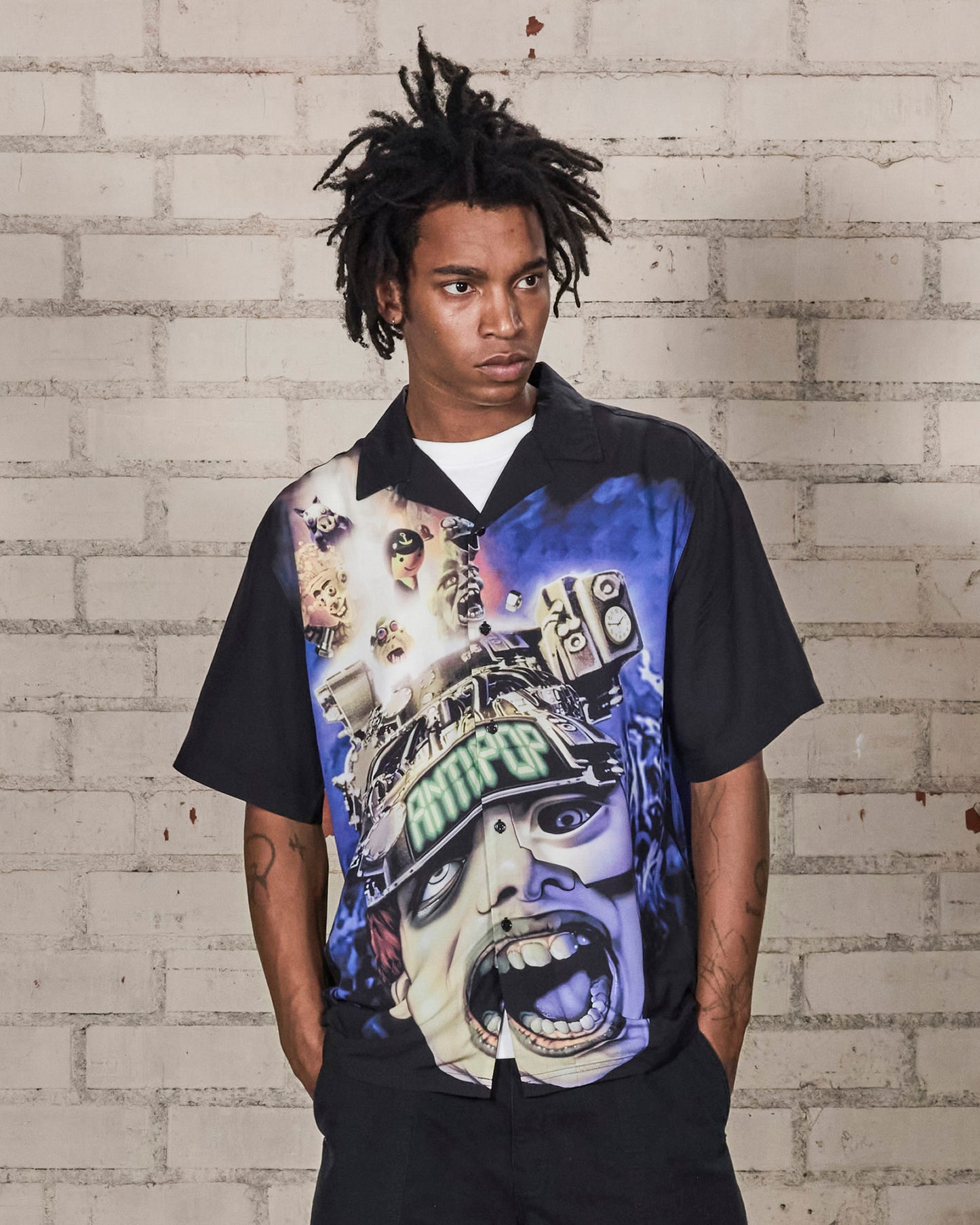 ANTI-POP BUTTON UP