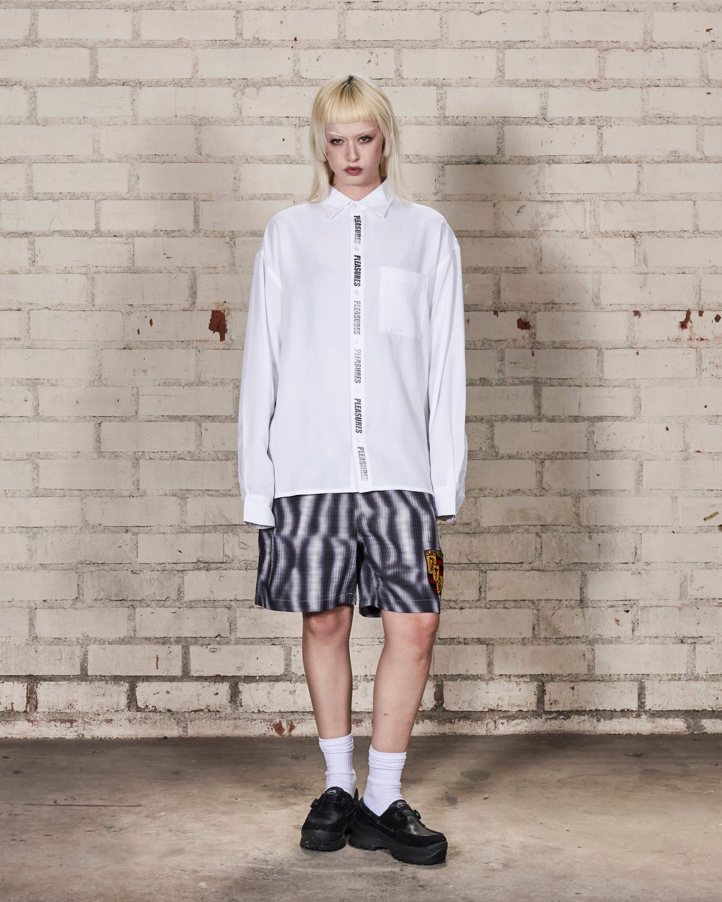 IMPACT BUTTON UP