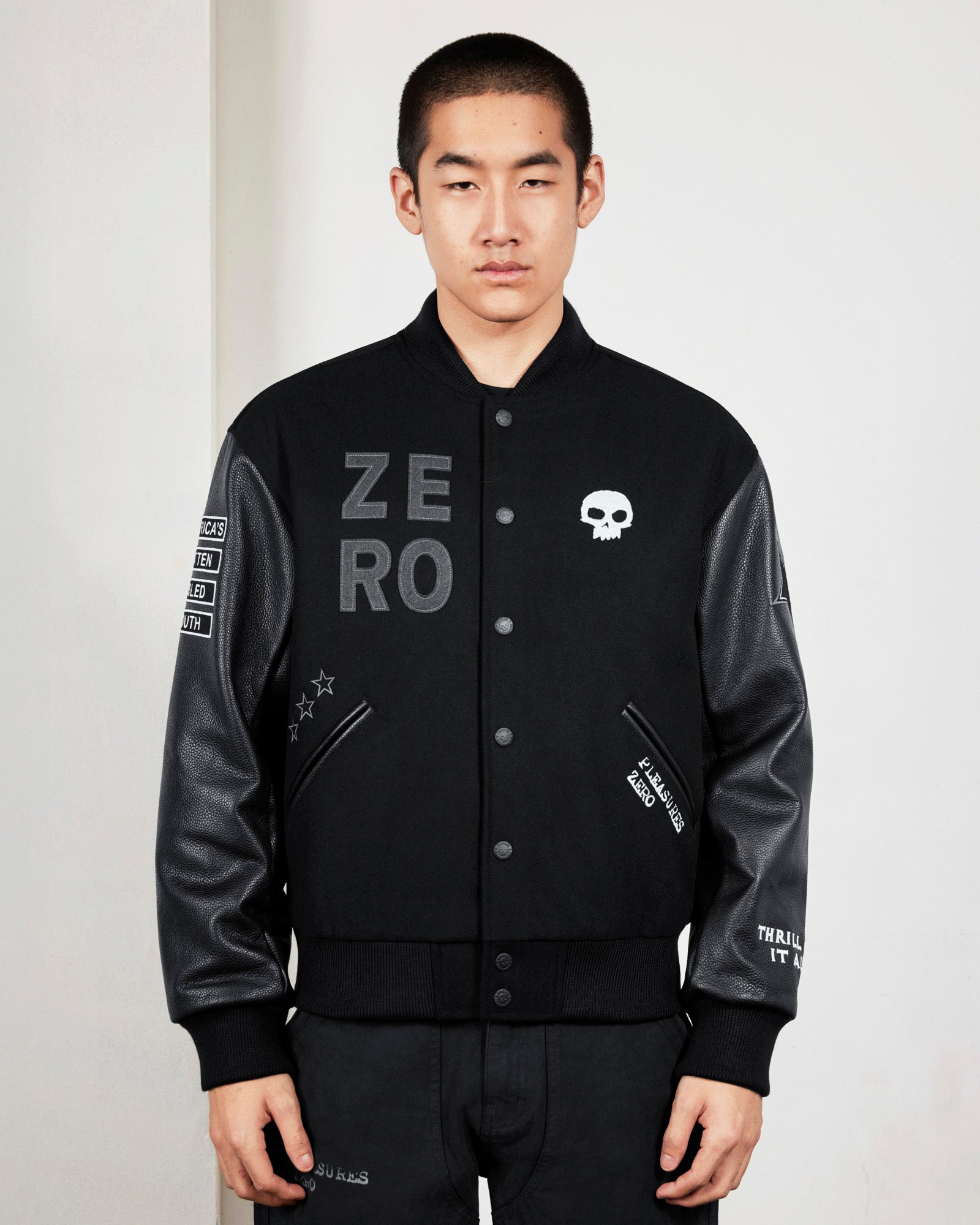 ZERO PLEASURES VARSITY JACKET
