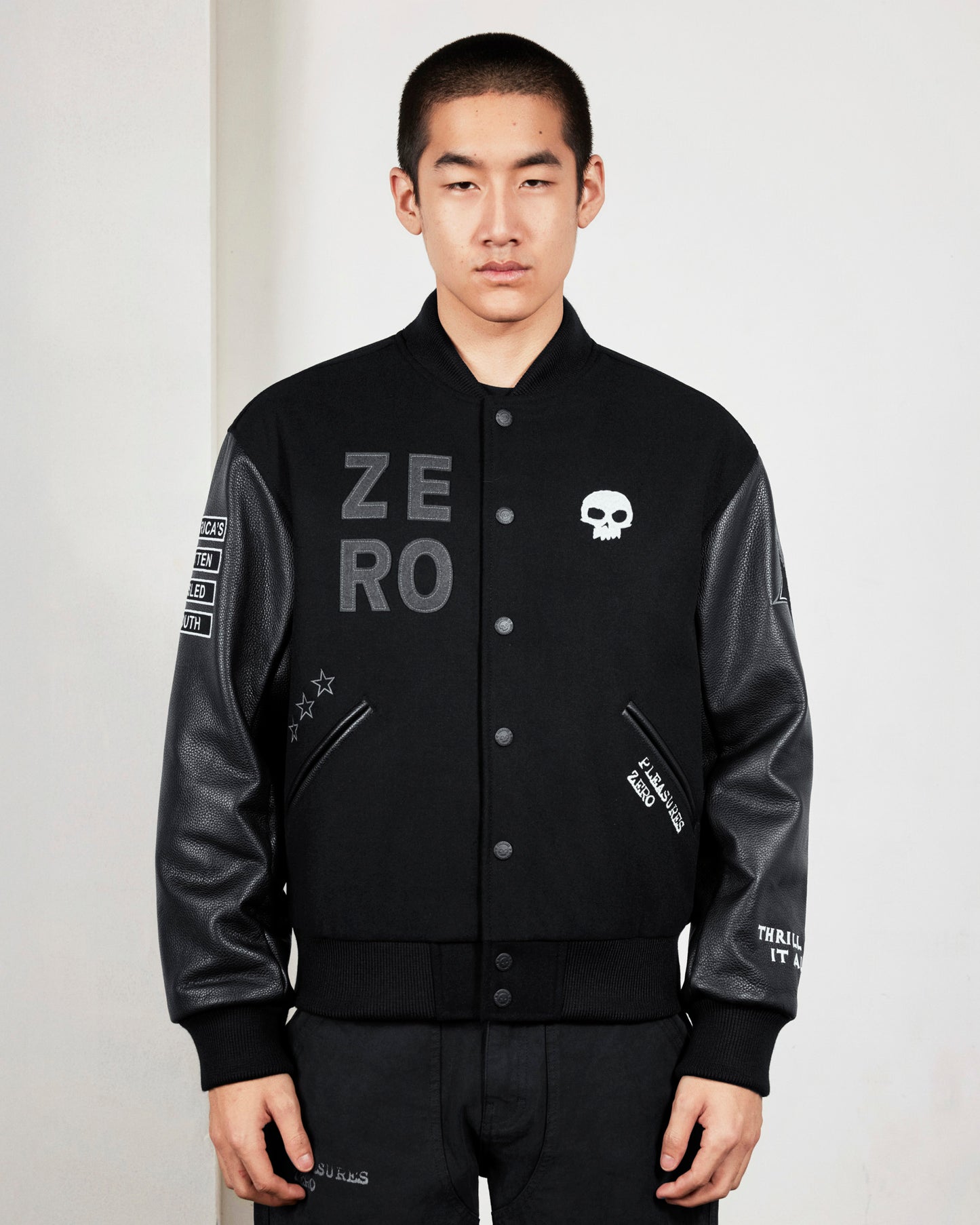ZERO PLEASURES VARSITY JACKET