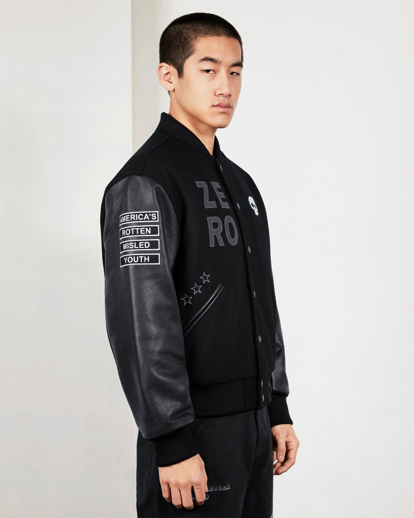 ZERO PLEASURES VARSITY JACKET