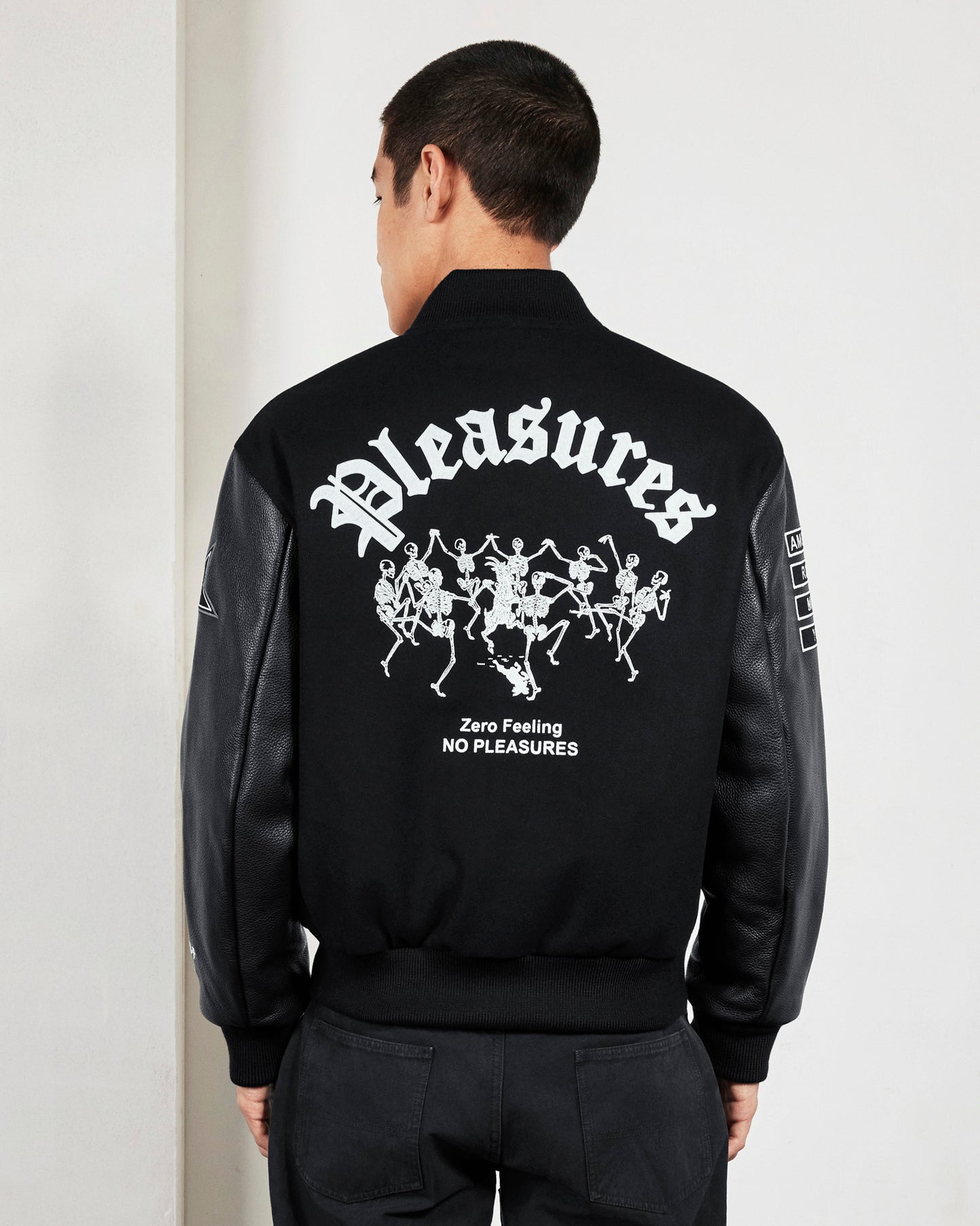 ZERO PLEASURES VARSITY JACKET